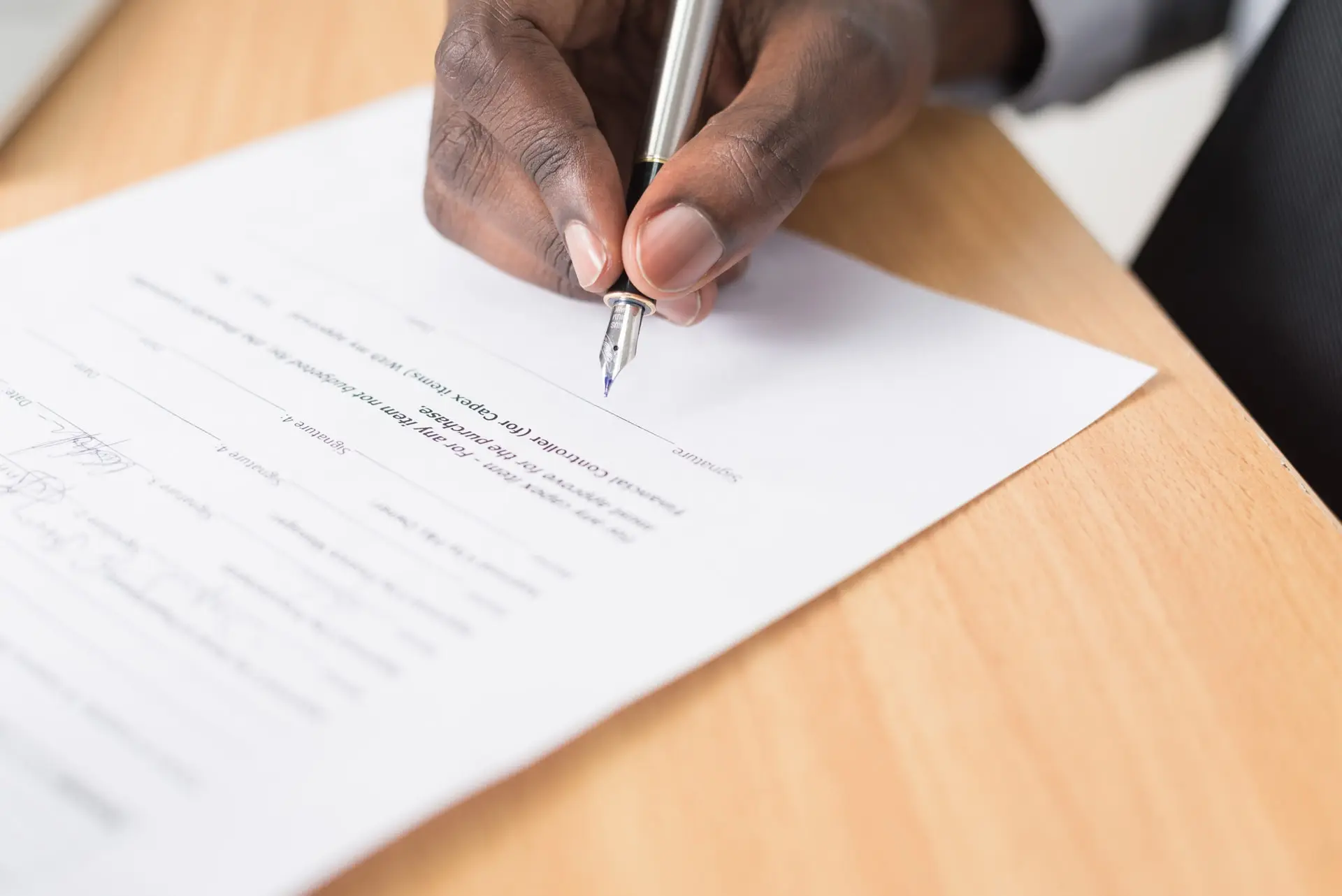 Person signing on agreement