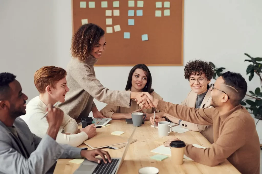 People handshake in business meeting